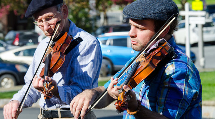 Fiddlers enjoying a traditional tune.