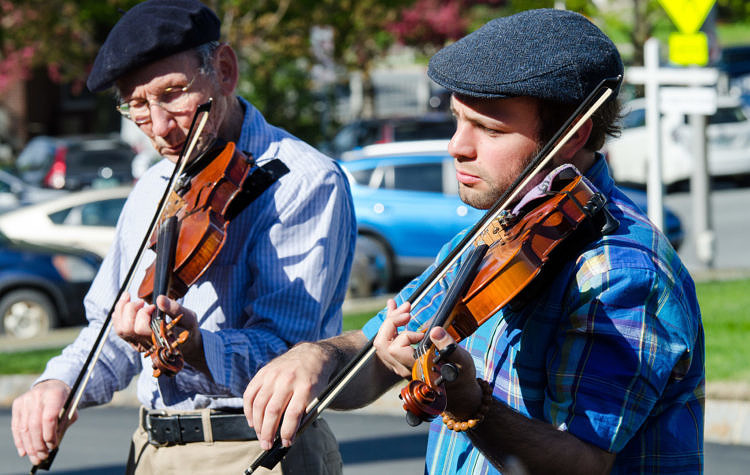 Fiddlers enjoying a traditional tune.