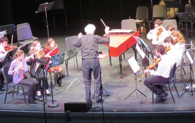 Mark Nelson conducts yough ensemble performance
