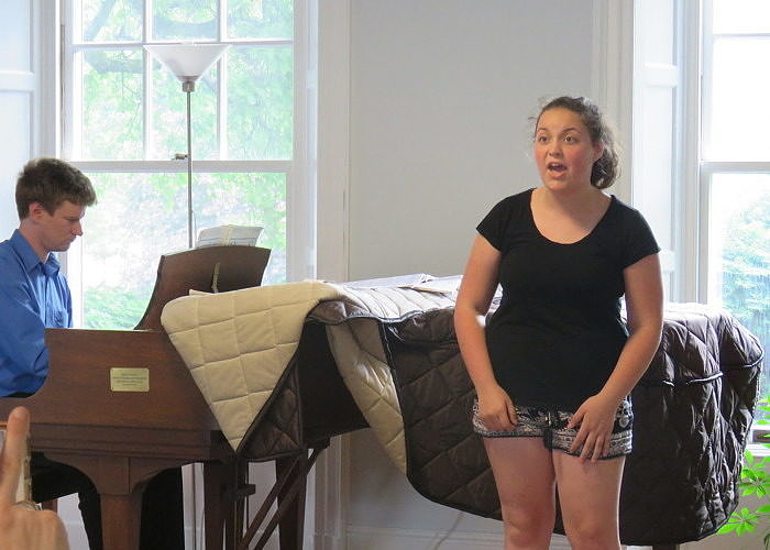 Teen Voice student sings with pianist