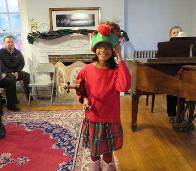 violinist with an elf hat on