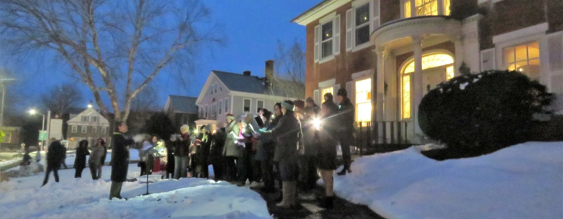 Carolers outside of UMVC
