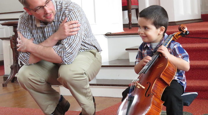 teacher and student with cello