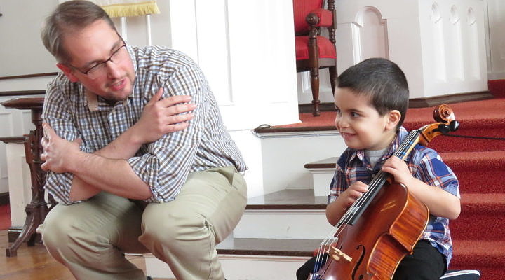 teacher and student with cello