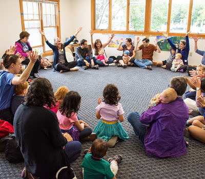Music Together class with kids in a circle