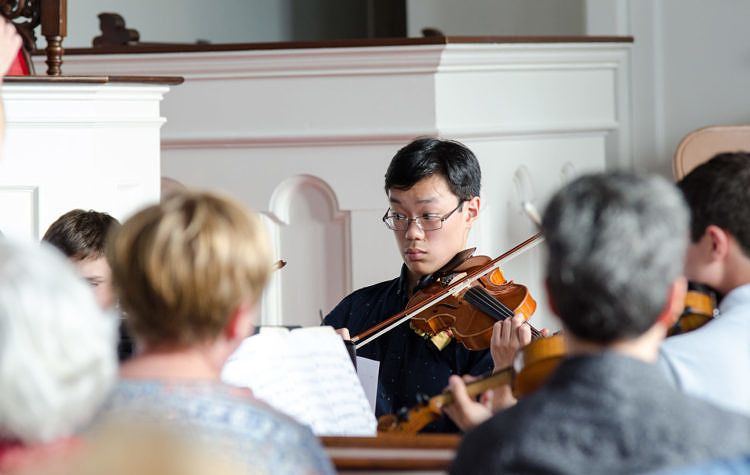 violin student performing with instructor