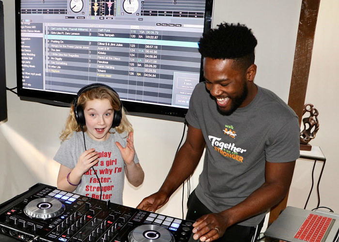 a dj with several teens
