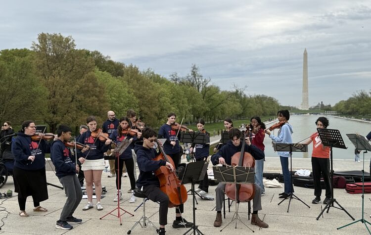 UVMC Tour Group performing in DC