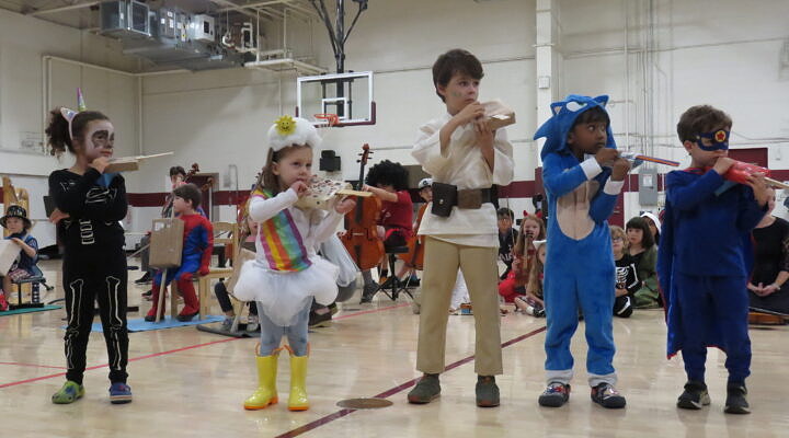 kids in costumes with instruments