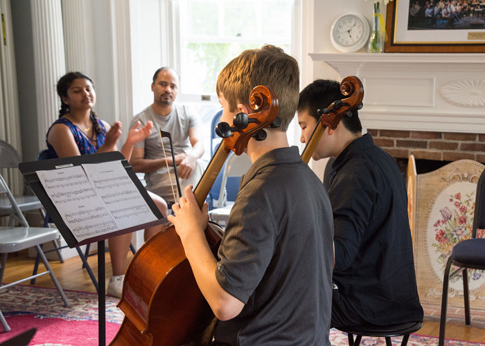 Duet of two violins performing chamber music