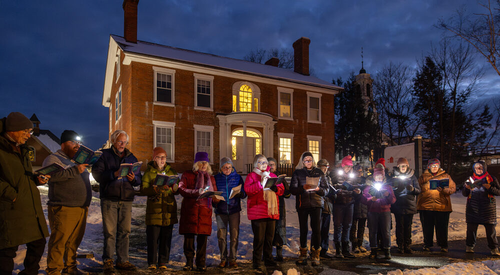 carolers in front of UVMC 