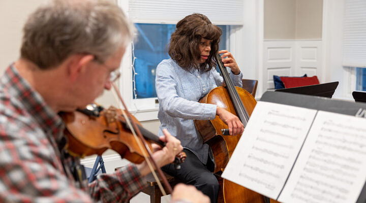 violin and cello in a chamber music setting